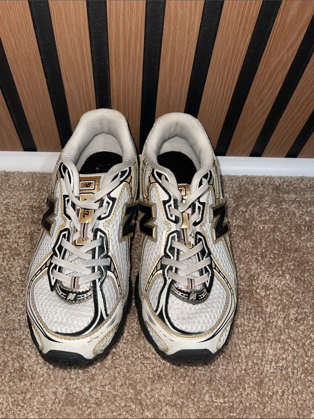 New Balance Kids White, Black and Gold Sneakers